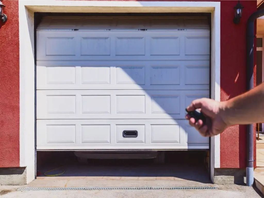 Modern garage door with automated maintenance, illustrating how subscription services help homeowners save money and effort